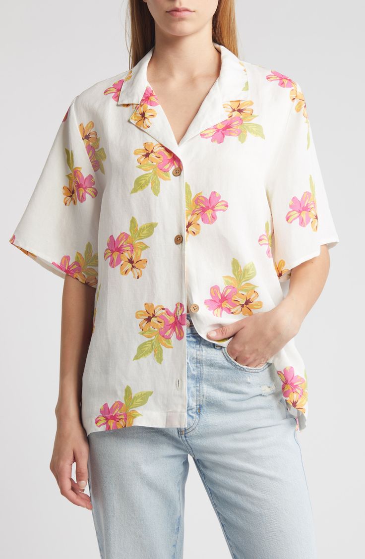 Pretty plumeria blossom against the breezy linen-blend backdrop of this relaxed camp shirt that fastens with a row of wooden buttons. Front button closure Notched collar Short sleeves Linen/viscose Machine wash, line dry Imported White Button-up Hawaiian Shirt For Spring, White Linen Camp Shirt For Spring, White Hawaiian Shirt With Button Closure For Vacation, White Hawaiian Shirt With Button Closure For Beach, White Floral Print Hawaiian Shirt For Spring, White Floral Print Camp Shirt For Spring, White Camp Shirt With Camp Collar For Spring, Casual Linen Tops With Floral Print, Spring Hibiscus Print Button-up Shirt