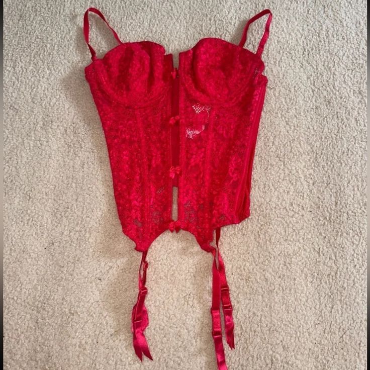 Nwt Victoria’s Secret Vintage Red Bustier Lace Corset Lingerie 34c. Never Worn, New With Tags. Very Bold & Sexy, Vintage Style From The 90s. Hard To Find This Exact Style Today. Super Cute, Just A Size Too Big For Me To Wear. Originally $55 Red Party Corset With Built-in Bra, Red Lace Corset For Party, Red Lace Party Corset, Red Corset With Built-in Bra For Night Out, Red Underwire Party Corset, Red Underwire Corset For Party, Victoria's Secret Red Party Bra, Party Corset With Built-in Bra In Red, Red Fitted Corset With Built-in Bra