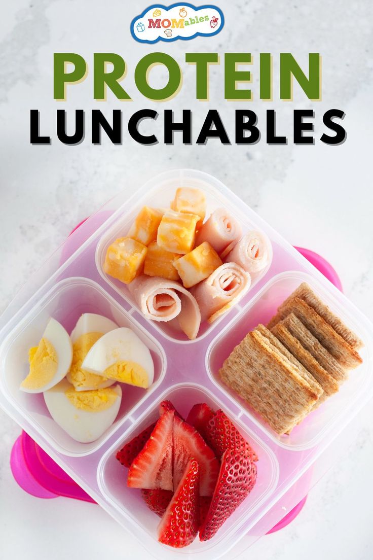 the lunch box is filled with fruit, crackers and other foods to make it easier for