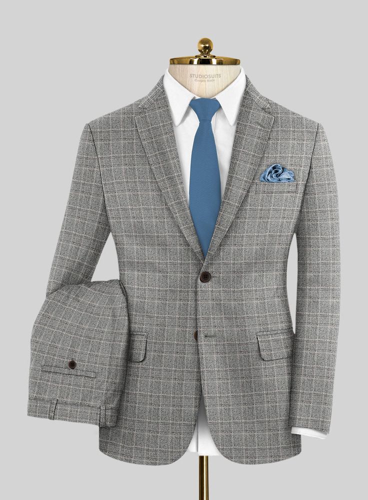 Immerse yourself in the seamless blend of opulence and fashion with our Loro Piana Niccolo Wool Suit. Expertly crafted from pure wool fabric and embellished with a sophisticated plaid pattern, the classy shade of gray not only harmonizes with the distinguished brown base but also introduces a subtle contrast that captures attention without being ostentatious. Whether destined for a wedding, a formal daytime affair, or simply as a refined addition to your personal style, this suit epitomizes sart Semi-formal Plaid Wool Suits, Elegant Plaid Business Suit, Luxury Plaid Suit For Office, Luxury Plaid Wool Tweed Jacket, Luxury Fitted Plaid Blazer, Elegant Plaid Blazer, Elegant Plaid Semi-formal Blazer, Elegant Plaid Blazer For Semi-formal Occasions, Elegant Semi-formal Plaid Blazer