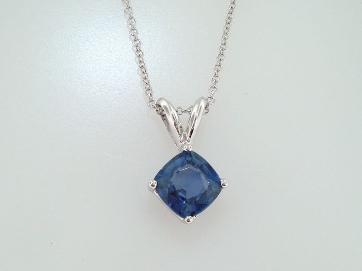 "HERE IS BEAUTIFUL CUSHION CUT CEYLON BLUE SAPPHIRE SOLITAIRE PENDANT NECKLACE 14 KARAT WHITE GOLD AVAILABLE YELLOW OR ROSE GOLD TOO ASK ME PLEASE COMES WITH 16\" OR 18\" INCH CHAIN CENTER CUSHION CUT CEYLON BLUE SAPPHIRE VERY SWEET LIGHT BLUE COLOR & CLEAN SAPPHIRE !! CENTER SHAPE- CUSHION CUT CUT- VERY GOOD CLARITY- AA COLOR- BLUE CARAT- 1.16ct MEASUREMENT- 5.95 X 5.90 mm TOTAL 1.16 CARAT RETAIL PRICE IS OVER $2,800.00 COMES WITH $2,250.00 CERTIFIED APPRAISAL !! DREAM IT I\"LL MAKE IT SPEC Luxury Blue Diamond-cut Necklace, Sapphire Diamond Cut Pendant Necklaces, Formal Sapphire Gemstone Necklace, Elegant Blue Hallmarked Necklace, Hallmarked Sapphire Necklace, Fine Jewelry Blue Topaz Necklaces For Formal Occasions, Formal Blue Topaz Fine Jewelry Necklaces, Formal Blue Topaz Necklace Fine Jewelry, Formal Fine Jewelry Blue Topaz Necklaces