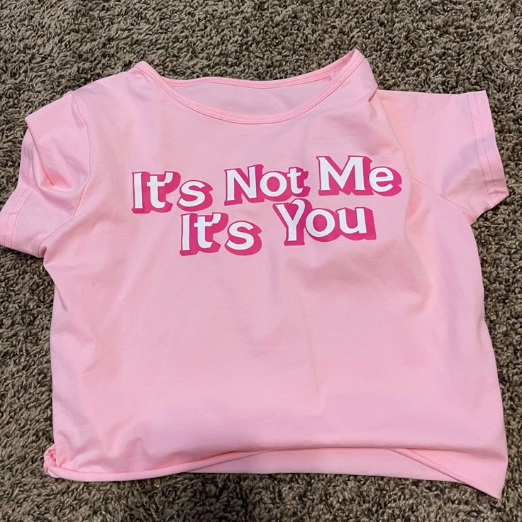 “It’s Not Me It’s You” Pink Baby Tee. Never Worn Graphic Baby Tees Aesthetic, Funny Baby Tees Women, Pink Slogan Tops Y2k Style, Fitted Pink Tops With Funny Text, Y2k Pink Slogan Tops, Cute Pink Tops With Funny Text, Pink Tops With Funny Text For Spring, Cute Logo Print Tops For Spring, Cute Pink Slogan Tops