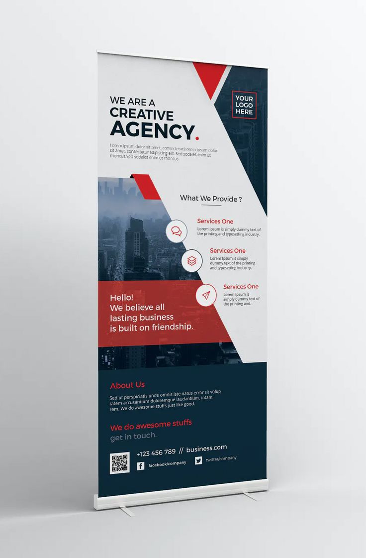 a roll up banner is displayed on a white background with red and blue accents, along with the words we are creative agency