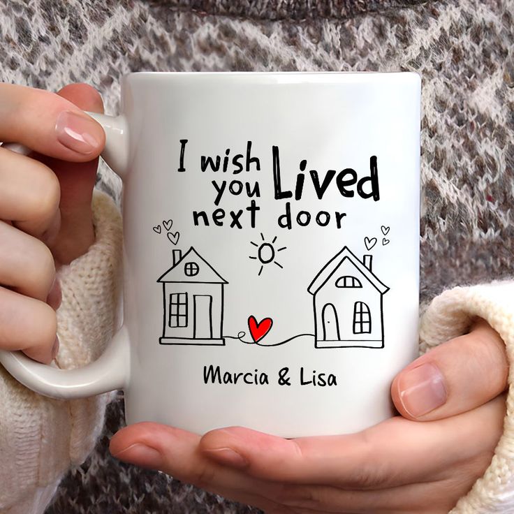 a woman holding a coffee mug with the words i wish i lived next door