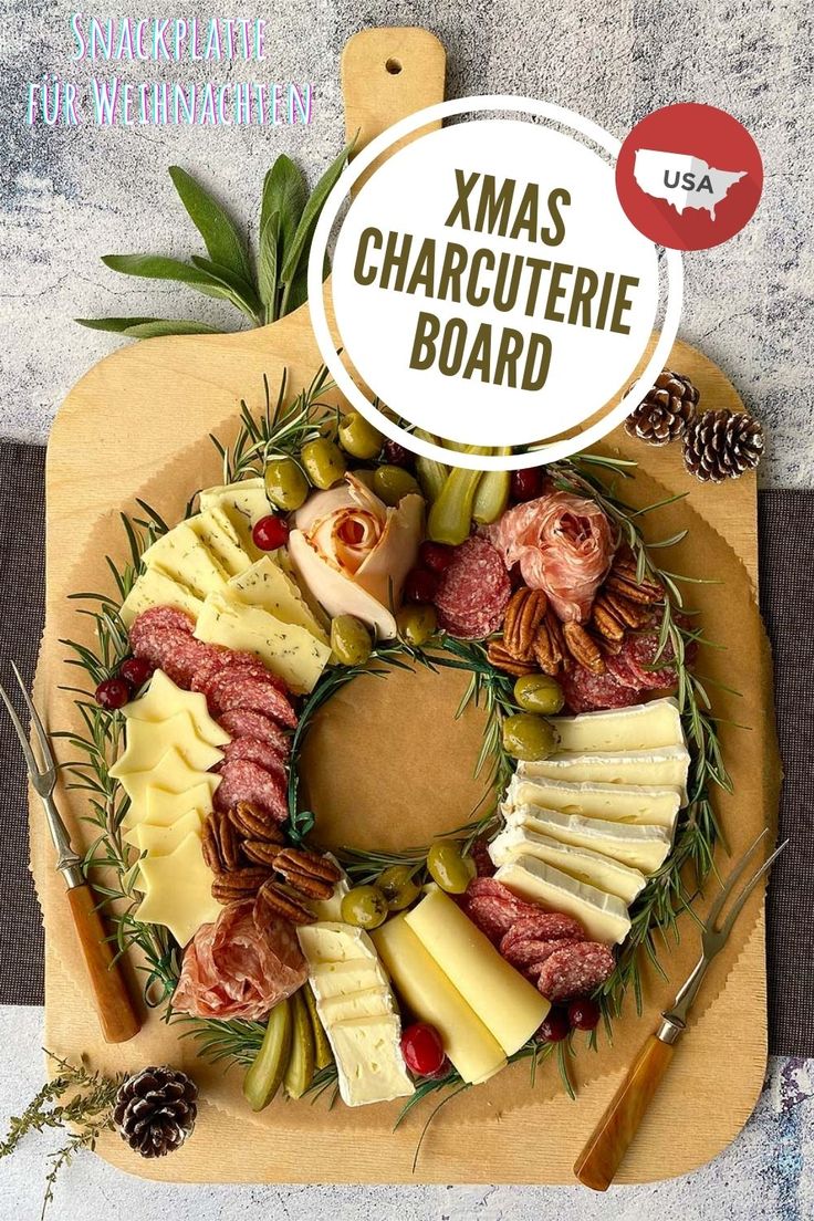 a christmas wreath made out of cheese and meats on a cutting board with the words xmas charcuterie board above it