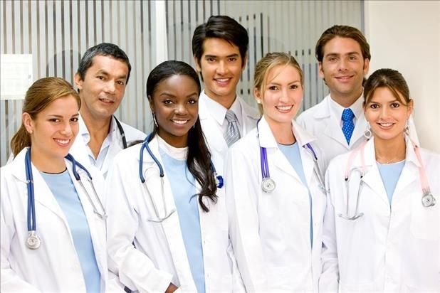 a group of doctors posing for a photo