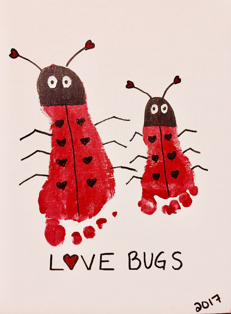 two ladybugs painted on white paper with black hearts and the words love bugs