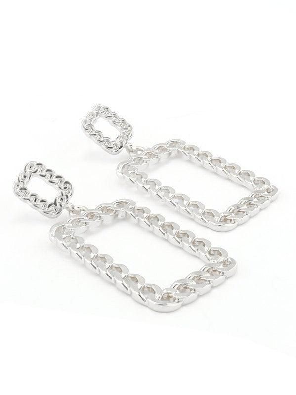 The chain dangles are rectangular shaped chain dangle earrings with post backs. In silver or gold. Trendy Sterling Silver Jewelry With Rectangular Links, Trendy Metal Jewelry With Rectangular Links, Trendy Rectangular Metal Jewelry, Chic Rectangular Metal Jewelry, Trendy Jewelry With Adjustable Rectangular Chain, Trendy Rectangular Jewelry With Adjustable Chain, Rectangular Metal Jewelry With Adjustable Chain, Trendy Metal Rectangular Pendant Jewelry, Trendy Silver Rectangular Earrings