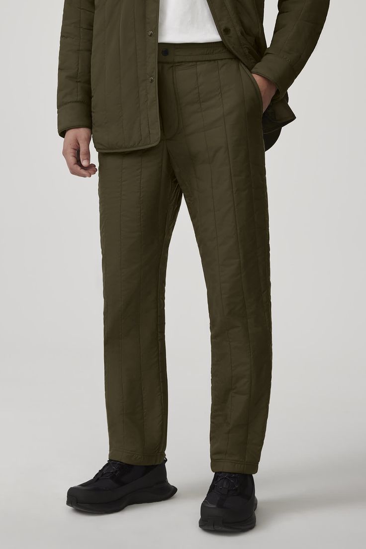 The Carlyle Quilted Pant is made with Nylon Pongee for water-repellent, wind-resistant protection with a smooth, sheen finish. It has an elasticized waistband and zipper fly and is equipped with two front side-entry pockets and a single back welt pocket,  providing optimal comfort with simple aesthetics. The Carlyle Pant is insulated with 100% TENCEL™ Lyocell, a biodegradable fibre made from wood pulp harvested from sustainably managed forests. Journey Boots, Simple Aesthetics, Quilted Pants, The Carlyle, Men Parka, Baby Outerwear, Mens Parka, Snow Pants, Snow Suit