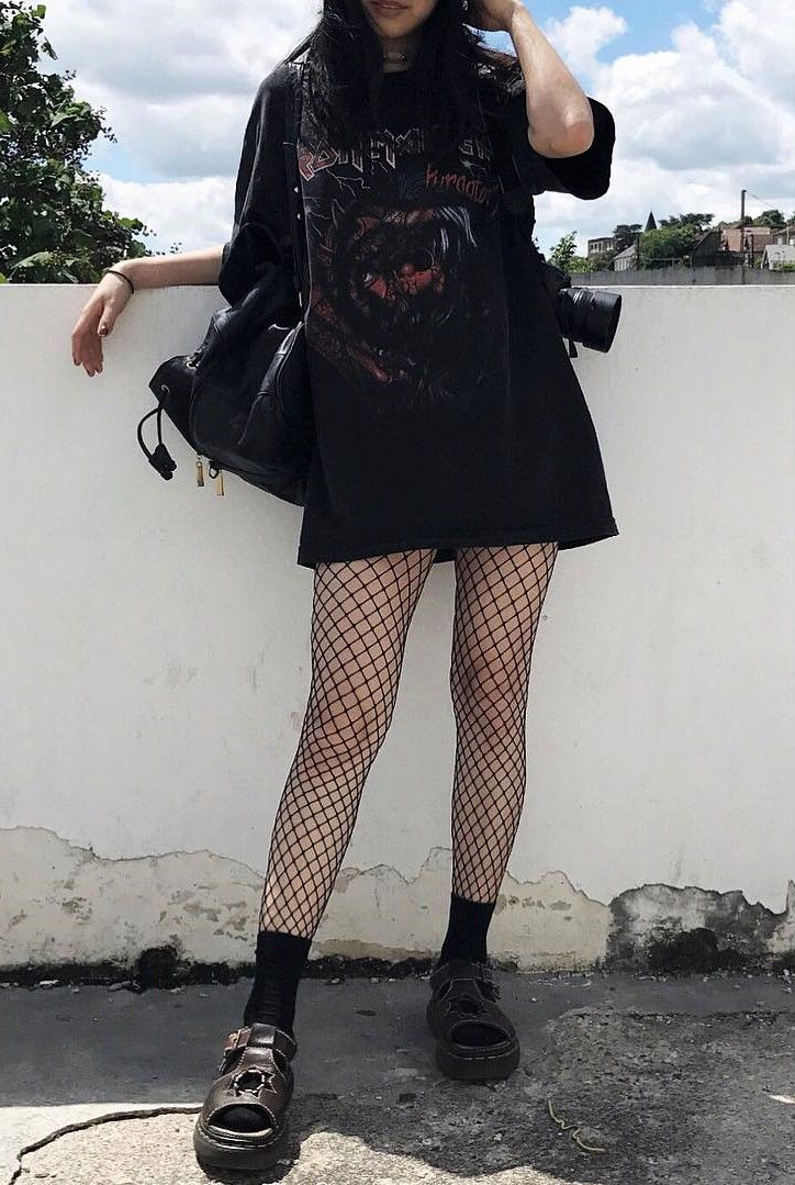 Oversized black graphic tee with fishnet leggings & Dr Martens shoes by everlastingpure - #fashion #grunge #alternative Mode Grunge Hipster, Vestiti Edgy, Look Grunge, 00s Mode, Fishnet Leggings, E Girl Outfits, Mode Emo, Mode Punk, Mode Hipster