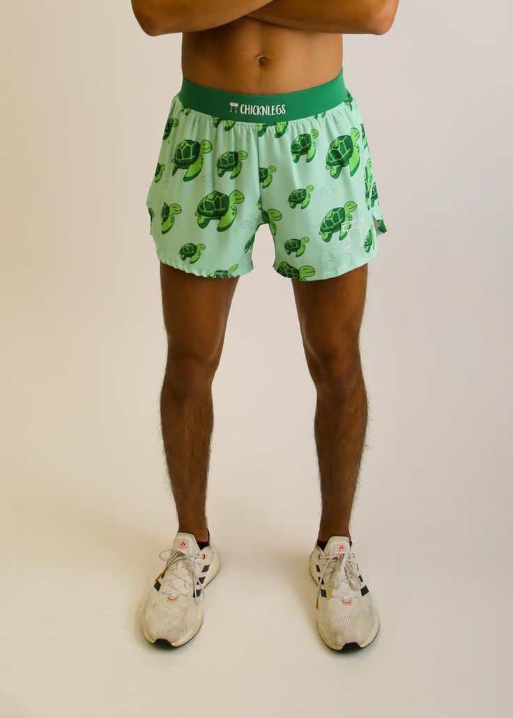 Do you have ChicknLegs? "We’re lean, we’re green, and we’re mean!" - TMNT. The ChicknLegs 4" split running shorts are known for their lightweight fabric, ultra soft liners, comfortable waistbands, and funny printed designs. Features: ✔ Soft elastic waistband provides a smooth fit that stays in place ✔ Rear zipper pocket to stash the essentials ✔ Black mesh liner offers full coverage and breathability✔ Machine washable ✔ 4" Inseam and 4" Side Split✔ Model is 5'10" - 150 lbs - Size M Green Athletic Shorts With Built-in Liner, Green Stretch Swim Trunks With Go-dry, Casual Green Boxer Briefs With Built-in Shorts, Green Casual Sports Boxer Briefs, Green Short Boxer Briefs For Sports, Casual Green Moisture-wicking Boxer Briefs, Green Moisture-wicking Boxer Briefs For Sports, Green Summer Sports Boxer Briefs, Casual Boxer Briefs With Elastic Waistband For Workout