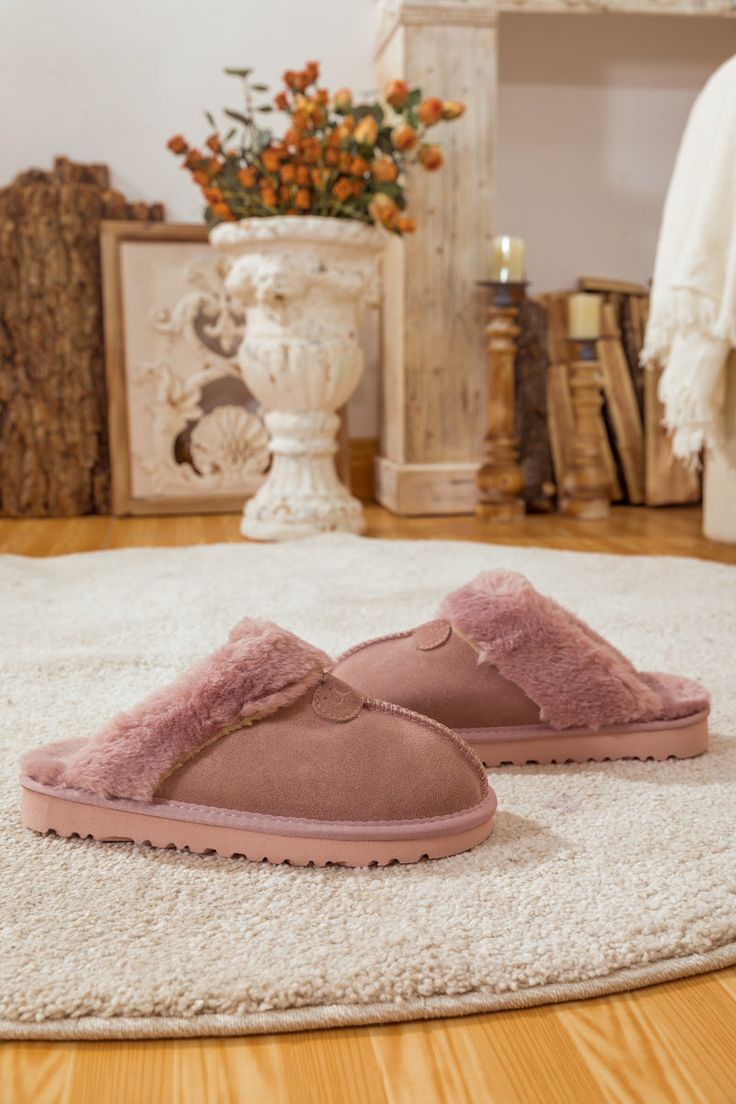 Deliver convenient slip-on comfort to their weekend mornings with these soft suede slippers designed with a cozy wool lining and durable rubber sole for indoor/outdoor use. Pairs perfectly with our chesterfield knit sweater or snug fleece lounge sets. 0.78'' heel Slip-on 100% leather upper 100% Wool lining Rubber sole Feature: Lightweight, ultra-soft fully woolen lined, anti-skid rubber sole. Super Soft Pink Slip-on Slippers, Comfy Pink Slippers With Cushioned Footbed, Indoor Suede Slip-on Slippers, Suede Slip-on Indoor Slippers, Pink Comfy Winter Slippers, Comfortable Pink Slippers With Cushioned Footbed, Comfortable Pink Slip-on Platform Slippers, Cozy Indoor Suede Slippers, Super Soft Slip-on Comfy Slippers