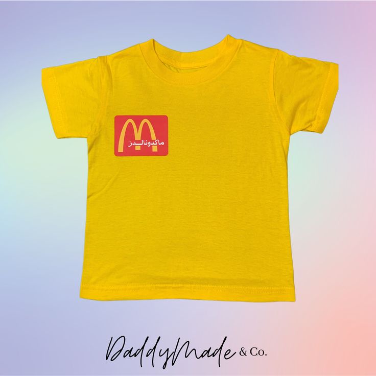 Funny McDonald's staff shirt  Please let us know if you want to custom your shirt. 🙏🏽 Fitted Short Sleeve T-shirt With Custom Print, Fitted Basic Shirt With Graphic Print, Fitted Graphic Tee With Logo Print, Fitted Short Sleeve Graphic Tee Shirt, Retro Unisex Short Sleeve Shirt, Trendy Yellow Shirt With Screen Print, Yellow Cotton Shirt With Custom Print, Yellow Cotton Tops With Custom Print, Unisex Cotton Shirt With Logo Print