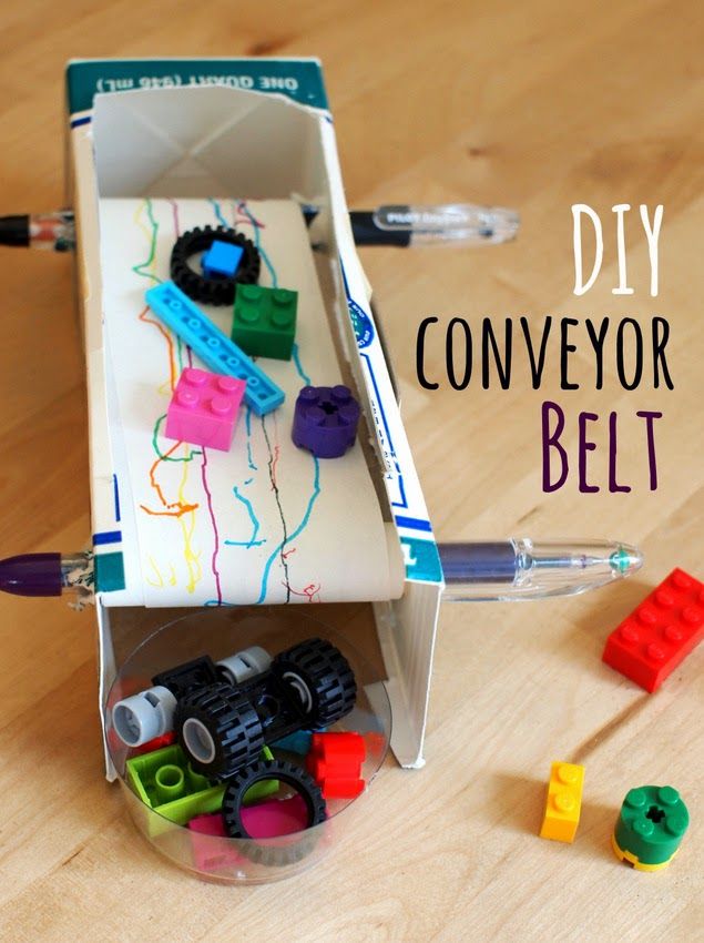 an open box with legos in it and the words diy conveyor belt