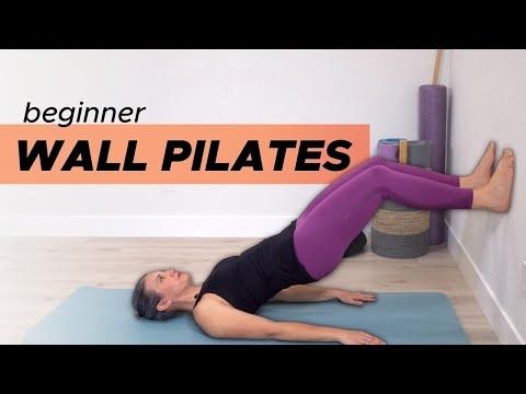 a woman is doing an exercise on the floor with her arms and legs stretched out