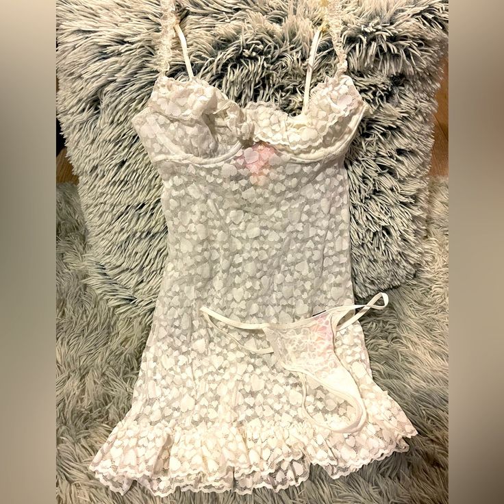 Victoria’s Secret White Hearts Lace Lingerie Set, Small, Nwt Beautiful White Lace With Heart Designs White String Matching Panties Beautiful Ruffle String Spaghetti Straps Beautiful Ruffle Semi Flared Skirt Fitted, See Through Perfect For Wedding Night, Valentines Or A Any Sexy Night Nwt Victoria's Secret Lace Sleepwear With Built-in Bra, White Lace Sleepwear For Bedtime, White Lace Sleepwear For Loungewear, Victoria's Secret White Camisole Sleepwear, White Lace Sleepwear With Built-in Bra, Fitted Delicate Lace Sleepwear For Bedtime, Fitted White Sleepwear For Sleepover, Fitted White Sleepwear, White Fitted Sleepwear For Wedding Night