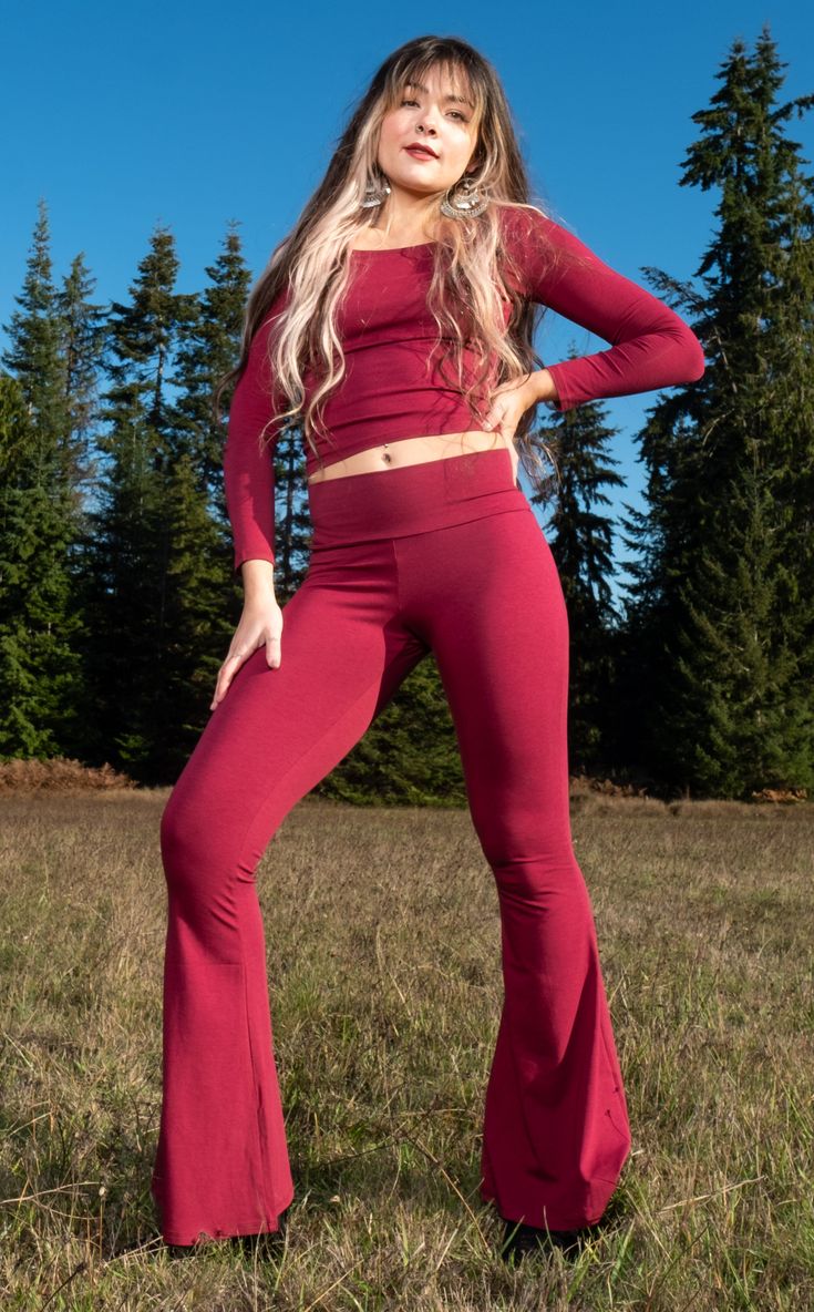 The Slim Bell Pants are the go-to everyday pant aka "the yoga pants." These puppies should be in constant rotation in your closet. We have taken our Flow Pant and toned it down on the flare and turned it up on the fit from hip to knee. Design Features: Wider waistband hits just under belly button Great for every day, dance, movement, hooping and yoga Super soft velvet Made in San Francisco, CA, USA Matching Long Sleeve Bamboo Top. Fabric Features: American Made Bamboo Fabric - Bamboo: 64%, Cotto Flare Yoga Pants For Fall, High Stretch Flare Yoga Pants For Fall, Fall Flare Yoga Pants, Fitted Wide Leg Yoga Leggings, Flare High Stretch Loungewear Bottoms, High Stretch Flare Loungewear Bottoms, High Stretch Flare Bottoms For Loungewear, High Stretch Flare Pants For Fall, Fall High-waisted Yoga Pants