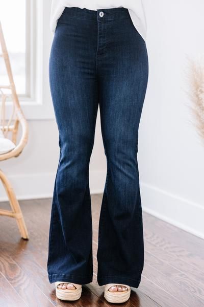 Your favorite flare jeans are now available in petites and they are just a fabulous and the regulars! The retro wide legs are super trendy and we love that crisp, dark wash! These flares will also give you legs for days! These jeans features a darker wash, flared legs, high waist, no front pockets, back pockets, and no belt loops. Material has generous amount of stretch.Jade is wearing the size 3. Petite Flare Jeans, Spring Jeans, Dark Wash Flare Jeans, Denim Outfits, Floral Cocktail Dress, Black Tie Dress, Long Sleeve Outerwear, Mint Julep Boutique, Two Piece Swimwear