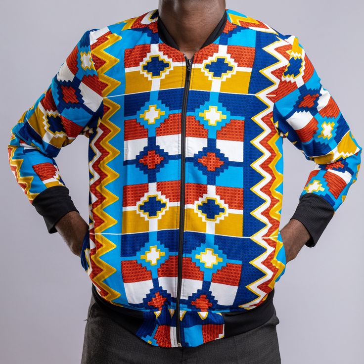 With carefully selected African fabric, these bomber jackets will give you a great look and can be matched with various selections to give that cool look all season. These vibrant colors are carefully curated to add that amazing casual look and feel. Enjoy our selection and peruse the size chart to see which of the jackets will best fit your body and your style.Kindly note that these jackets are not quilted thus suitable for less colder seasons Trendy Multicolor Long Sleeve Windbreaker, Multicolor Cotton Outerwear For Streetwear, Casual Multicolor Patchwork Windbreaker, Multicolor Cotton Outerwear With Stand Collar, Casual Multicolor Track Jacket For Spring, Casual Multicolor Spring Track Jacket, Urban Multicolor Patchwork Outerwear, Casual Multicolor Varsity Jacket For Streetwear, Casual Multicolor Track Jacket For Fall