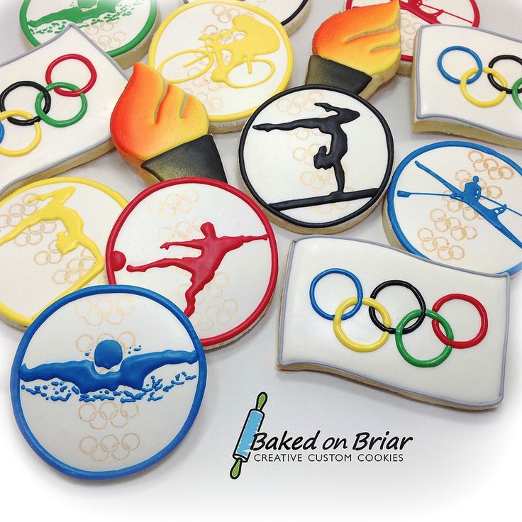 the olympic cookies are decorated with fondant