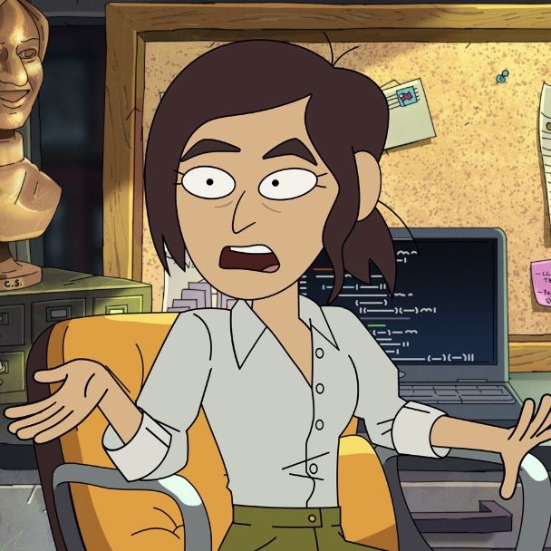 an animated woman sitting in front of a laptop computer