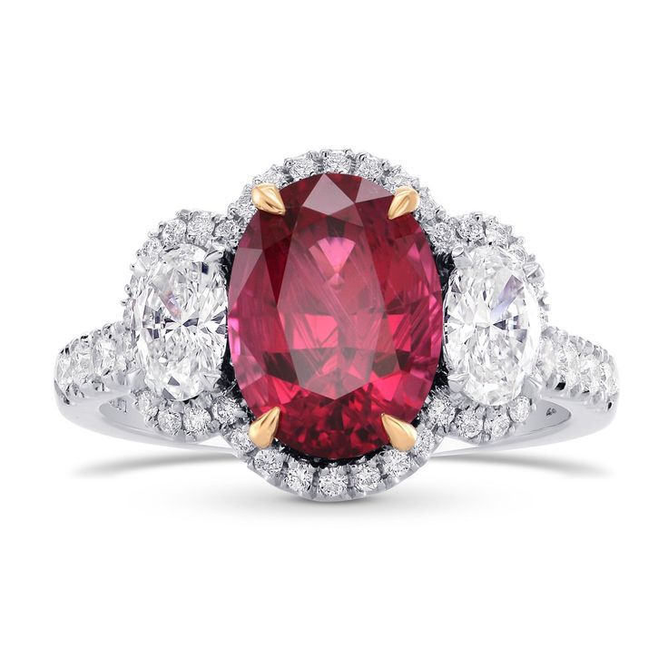 an oval shaped ruby and diamond ring