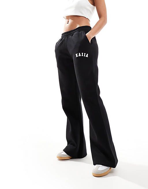 Kaiia wide leg sweatpants in black | ASOS Wide Leg Stretch Sweatpants For Streetwear, Stretch Wide Leg Sweatpants For Streetwear, Black Straight Leg Sweatpants With Letter Print, Streetwear Wide Leg Pants With Comfort Waistband, Wide Leg Pants With Comfort Waistband For Streetwear, Sporty Wide Leg Pants With Elastic Waistband For Streetwear, Sporty Wide Leg Pants With Letter Print, Relaxed Fit Wide Leg Sweatpants With Letter Print, Wide Leg Bottoms With Ribbed Waistband For Streetwear