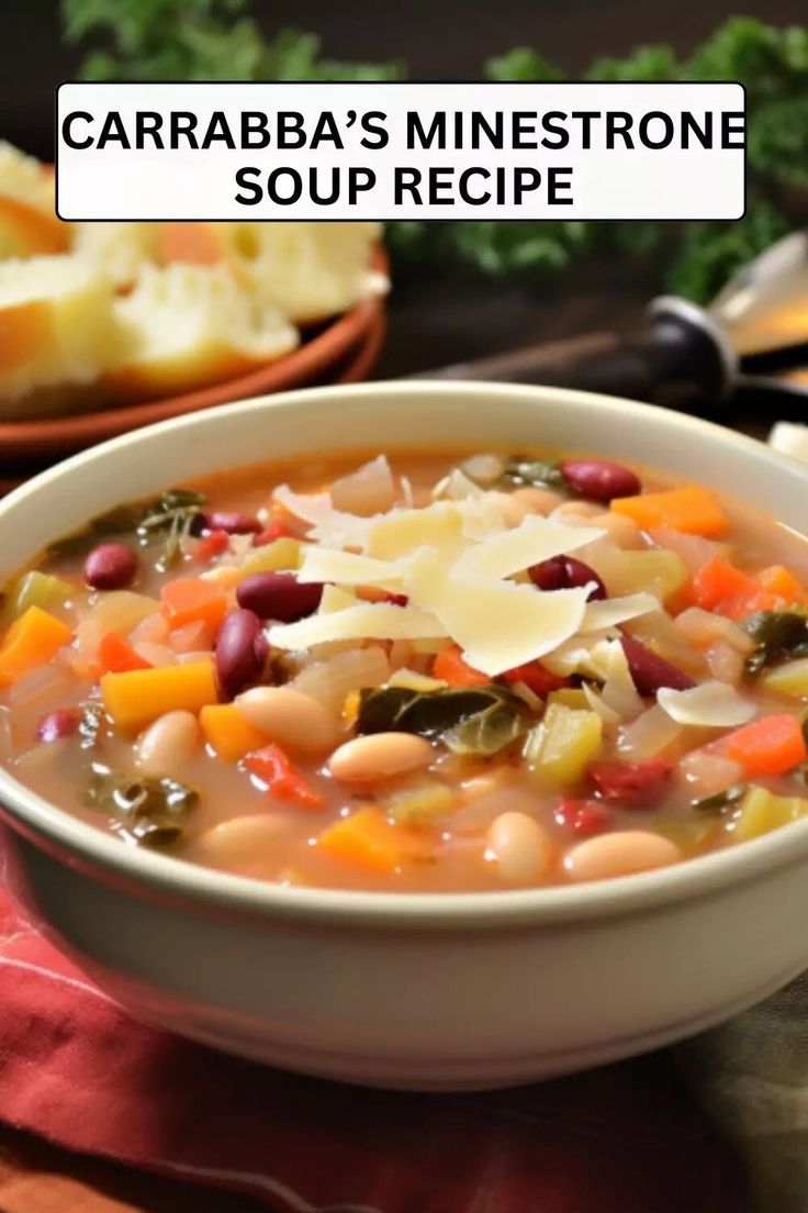 a white bowl filled with soup next to bread