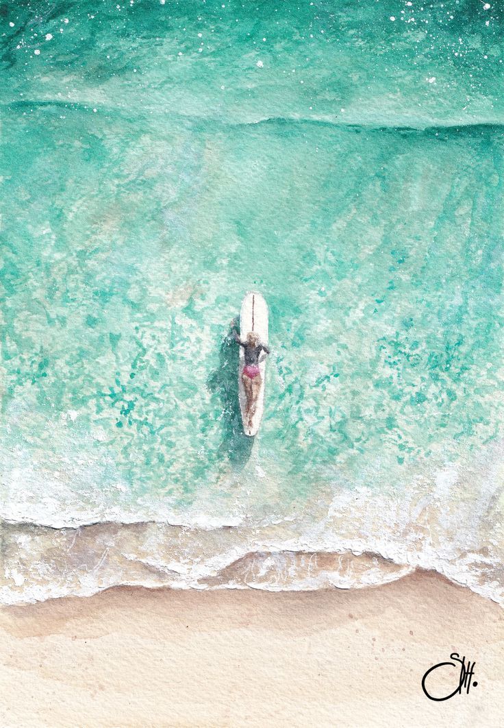 an aerial view of a surfboard in the ocean