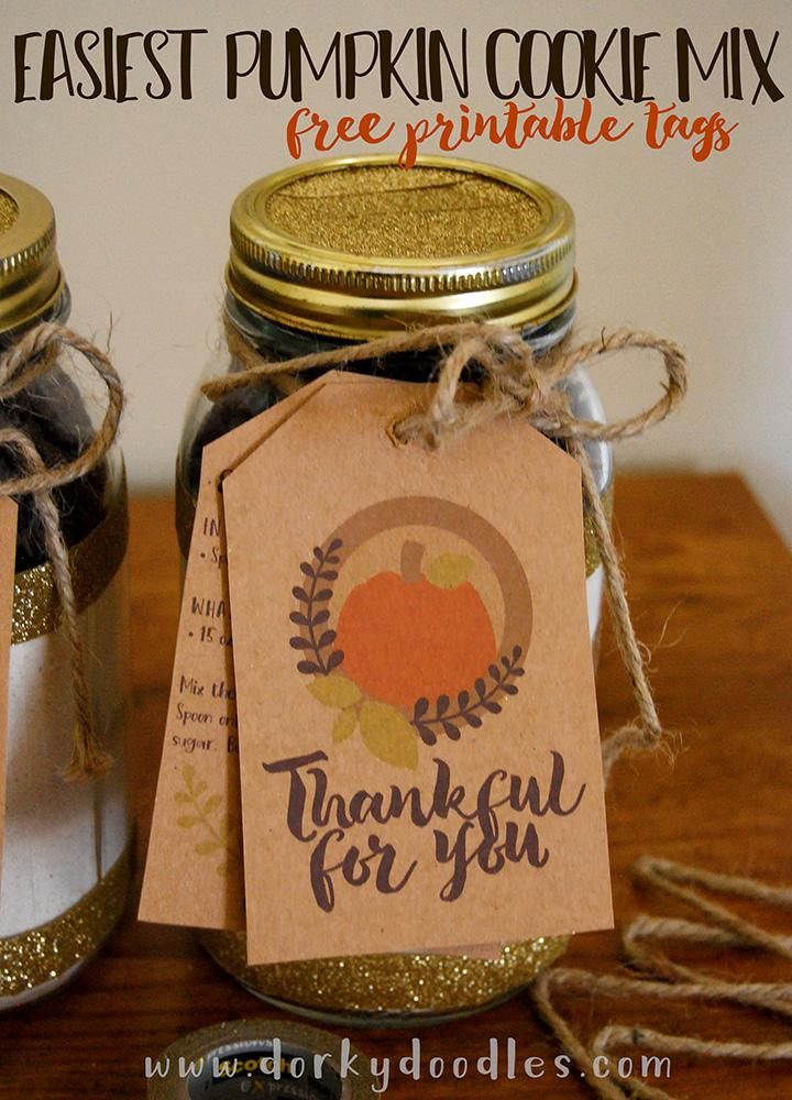 two mason jars with thanksgiving tags on them