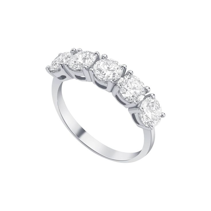 a five stone diamond ring with four stones on each side and three diamonds in the middle