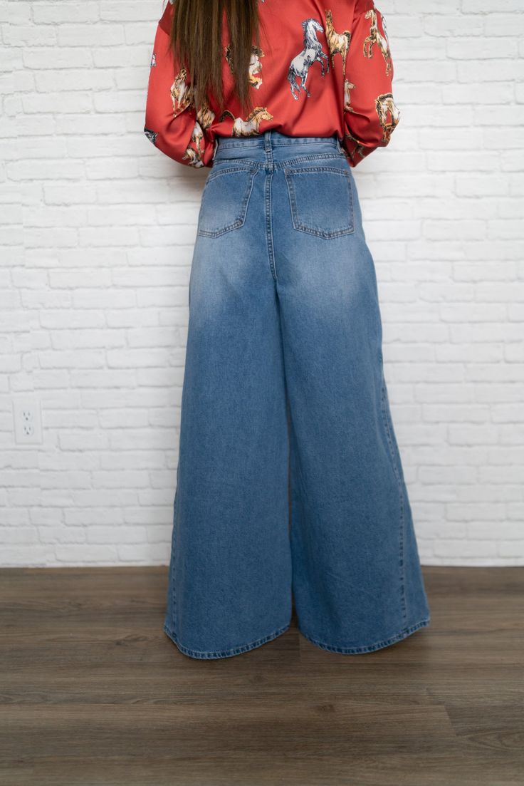 It is official, wide leg jeans are in! A very flattering fit! 98% cotton 2% elastane High waisted Relaxed fit Boho belt loops Stretch denim Zip closure Model is 5'0" and wearing a size small: The length of a size small measures and the inseam measures. X-Small: 0-2 Small: 2-4 Medium: 6 Large: 8 XL: 10 Boho Belt, Types Of Jeans, Boho Belts, Jeans For Sale, Wide Leg Jeans, Stretch Denim, Leg Jeans, That Look, Wide Leg