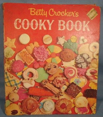 the betty crocker's cooky book is shown on a white surface