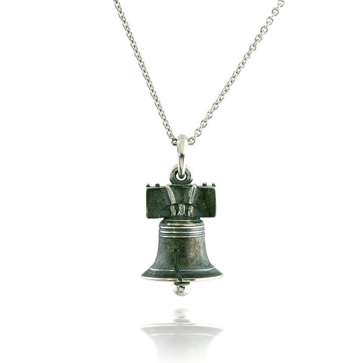 Barsky exclusive Liberty Bell pendant in sterling silver. Inspired by one of Philadelphia's most iconic and historic symbols. This pendant is made right here in Philadelphia just blocks from the Liberty Bell. Our liberty bell pendant is made in sterling silver on an 18"inch sterling silver chain. This pendant features a moving clapper. This products size is approximately 16.3mm by 12mm *These very special products can take up to 2 weeks for delivery. Classic Sterling Silver Pendant Charm Necklace, Classic Sterling Silver Charm Necklace, Classic Sterling Silver Necklace For Memorial, Classic Engraved Sterling Silver Charm Necklaces, Classic Sterling Silver Engraved Charm Necklace, Classic Engraved Sterling Silver Charm Necklace, Lux Gifts, Liberty Bell, Bell Pendant