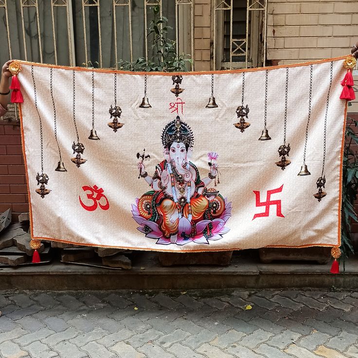 there is a banner with an image of ganesh on it