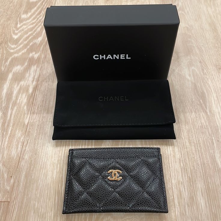 Brand New Chanel Caviar Card Holder In Black With Gold Hardware. Full Set As Pictured. Purchased At Chanel Waikiki Boutique And Still Super Hard To Come By. Please Note This Version No Longer Comes With An Authenticity Card. Elegant Card Holder With Card Slots, Designer Black Bifold Card Holder, Luxury Black Wallet With Interior Card Slots, Luxury Black Card Holder With Card Slots, Designer Black Wallets With Interior Card Slots, Elegant Textured Leather Rectangular Wallet, Elegant Black Bifold Card Holder, Elegant Textured Leather Wallet, Luxury Black Wallet With Rfid Blocking