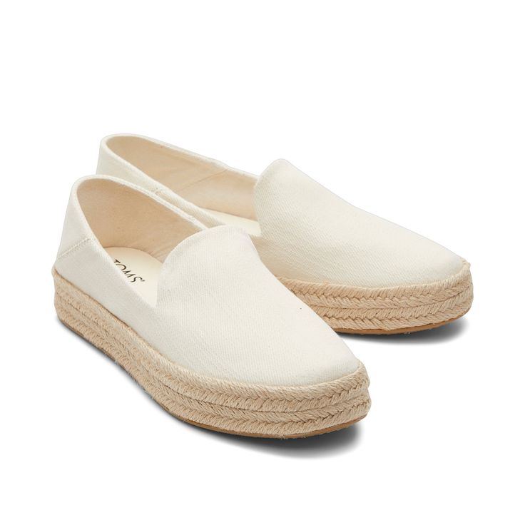 Our flatform Carolina slip-on is the perfect blend of form and function. With a just-right espadrille height to elevate your day, a chic rope wrap to take your outfits up a notch, and cushy insoles to keep you comfy. Make them your new closet staple. Heavy twill textile upper. Removable OrthoLite® EcoLT-Hybrid™ insole for enhanced comfort and breathability made with 26% eco content including 15% hybrid materials, 6% bio-oil and 5% recycled rubber. Rope-wrapped flatform midsole with DTM top stitc Spring Platform Closed Toe Slip-ons, Beige Platform Loafers With Rubber Sole Casual, Beige Casual Platform Loafers With Rubber Sole, Casual Beige Flat Platform Loafers, Comfortable Slip-ons With Contrast Sole For Spring, Casual Natural Color Slip-ons For Spring, Spring Platform Slip-ons With Round Toe, Spring Beige Platform Loafers With Rubber Sole, Spring Platform Loafers With Textured Sole