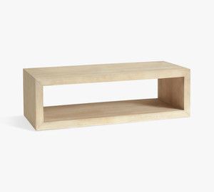 a small wooden shelf with no shelves on it