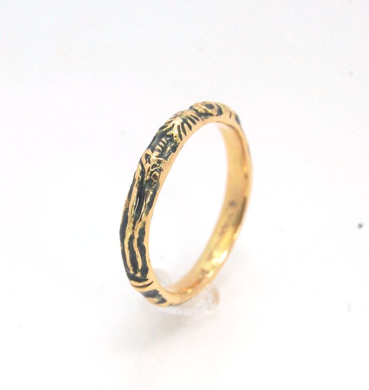 This is the most narrow of my Memento Mori rings at 3mm wide and is cast in 14k rich yellow gold. The Skeleton is flanked by intertwined hearts on one side.14k rich yellow gold and EnamelMade to Order. Usually ships in 3-5 days.This ring looks great as part of a stack, as a wedding band, a right-hand ring, or a promise ring, and all by its damn self, thank you very much. And as always, my rings are Unisex. Y’all wear what you want!I made these Memento Mori rings for my older sister Jill, a famou Yellow Gold Brass Promise Ring, Yellow Gold Brass Engraved Ring For Promise, Unique Gold Stackable Rings For Promise, Unique Gold Stackable Promise Rings, Unique Gold Engraved Promise Ring, Hand Forged Gold Engraved Promise Ring, 14k Gold Hand Forged Promise Ring, Unique Yellow Gold Stackable Rings For Anniversary, Hand Forged Yellow Gold Promise Jewelry