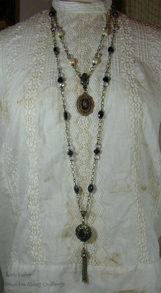 A long necklace is inspired by PBS's Downton Abbey.  It boasts vintage black glass beads and AB crystal beads with a vintage locket and tassel pendant.  The shorter necklace has matching AB crystals and vintage faux pearls.  The focal has a vintage glass cabochon with gold starburst design on a Victorian style brass ox bezel.  Thank you B'sue for the oldies but goodies! Long Vintage Necklace, Long Necklaces Aesthetic, Vintage Long Necklace, Vintage Beaded Long Necklace, Victorian Style Gold Beaded Necklace, Beaded Victorian Necklace, Vintage Adjustable Beaded Long Necklace, 1920s Tassel Necklace, Vintage Glass Necklace With Oval Beads