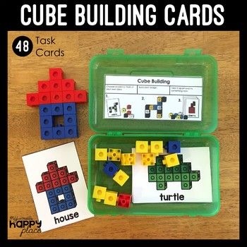 cube building cards in a plastic case with instructions