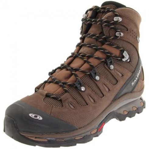 a brown hiking boot with black laces on the outstep and side zipper