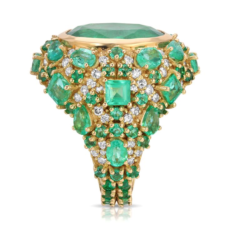 Emerald Bomba Diamond Cocktail Ring Luxury Emerald Ring With Pave Setting, Luxury Emerald Birthstone Ring, Luxury Yellow Gold Emerald Ring With Baguette Diamonds, Luxury Emerald Ring In Yellow Gold With Baguette Diamonds, Luxury Tsavorite Emerald Ring For Formal Occasions, Luxury Green Emerald Ring With Single Cut Diamonds, Luxury Green Emerald Ring, Luxury Green Rings With Baguette Diamonds, Luxury Emerald Diamond Ring With Baguette Cut