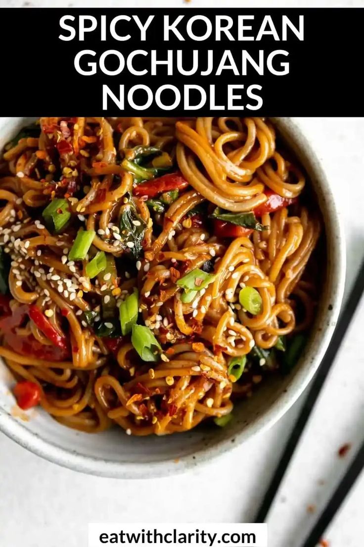 spicy korean gochuang noodles in a bowl with chopsticks on the side