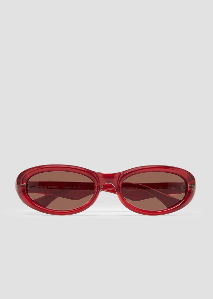 This colorway is currently sold out and available for pre-order purchase only. All pre-orders will ship by late September. Thick, rounded TR90 frames with angular temples and metal detailing. Transparent red frames with brown lenses. Modern Red Cat Eye Sunglasses With Gradient Lenses, Classic Red Sunglasses With Mirrored Lenses, Modern Red Sunglasses With Tinted Lenses, Modern Red Tinted Sunglasses, Classic Red Cat Eye Sunglasses, Red Glasses, Bonnie Clyde, Red Sunglasses, Fashion Eye Glasses