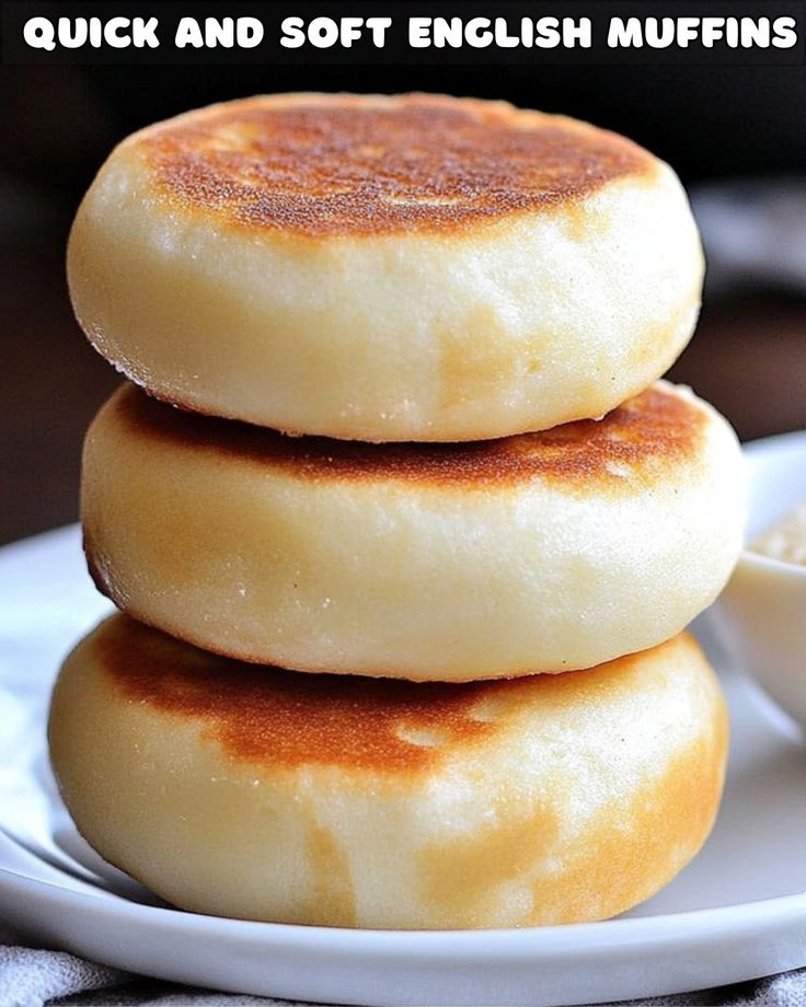 three english muffins stacked on top of each other in front of a bowl