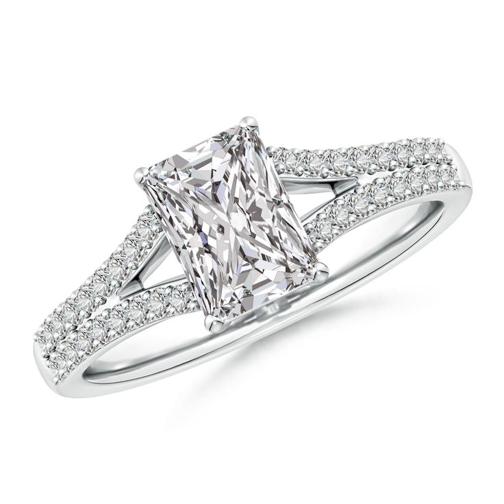 an engagement ring with a princess cut diamond in the center and pave set shoulders