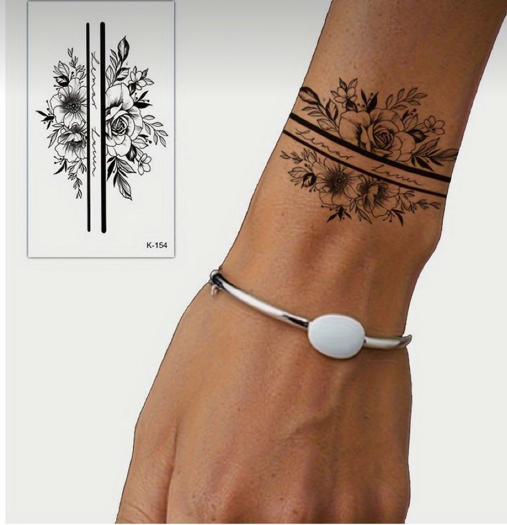 a woman's wrist with a flower tattoo on it and a white bead bracelet