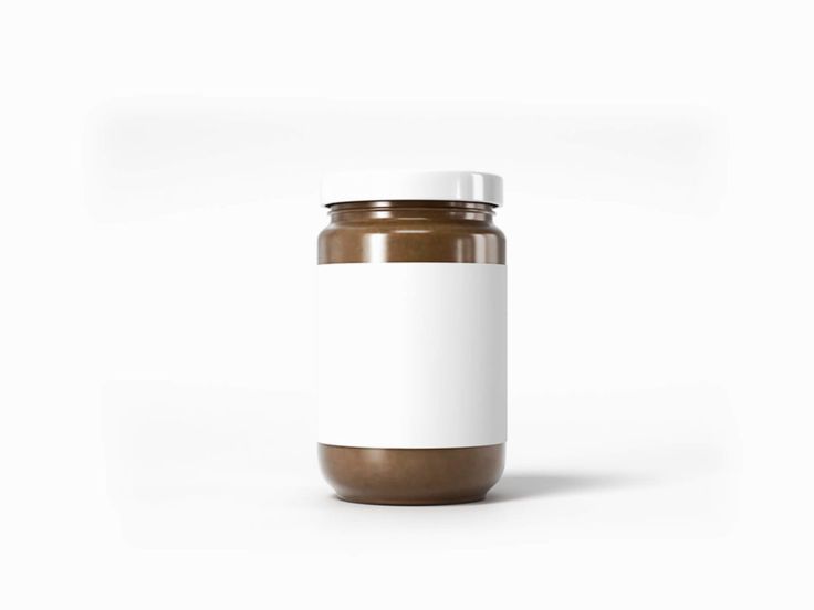 an empty jar with a white label on the front and brown bottom, sitting against a white background