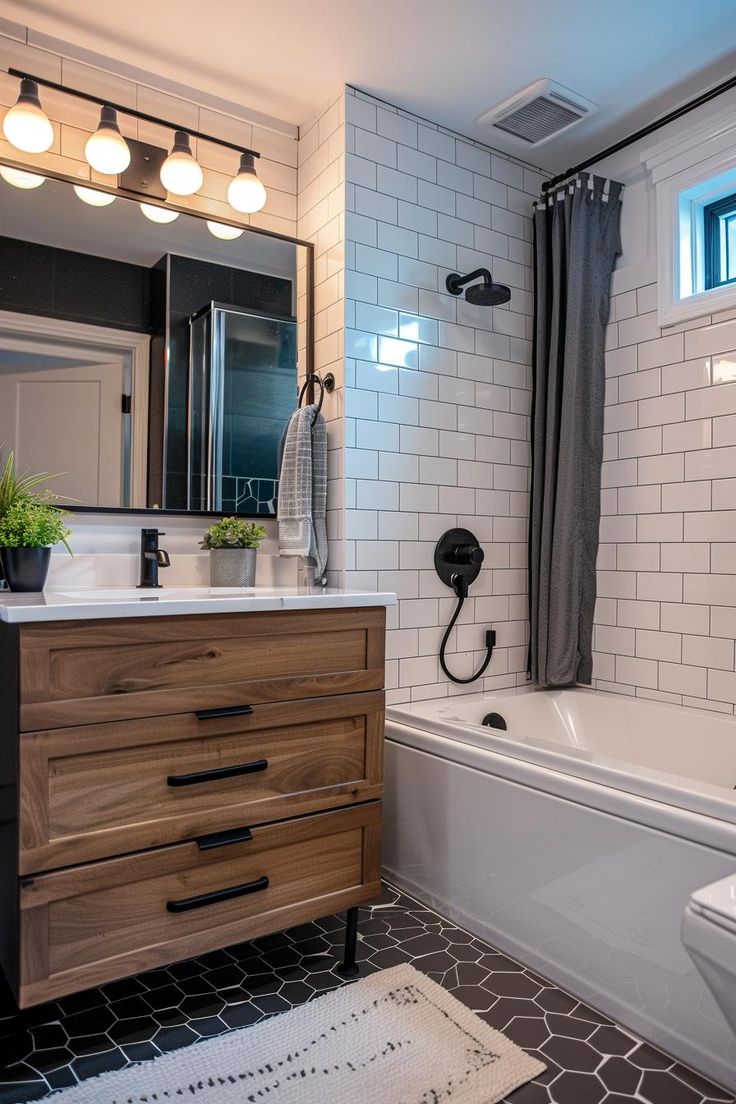 a bathroom with a sink, toilet and bathtub